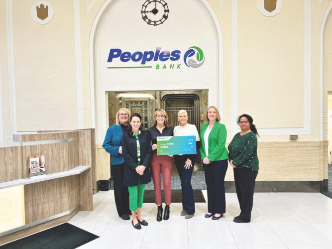 Community partnership: People’s Bank donates $10K to EVE non-profit